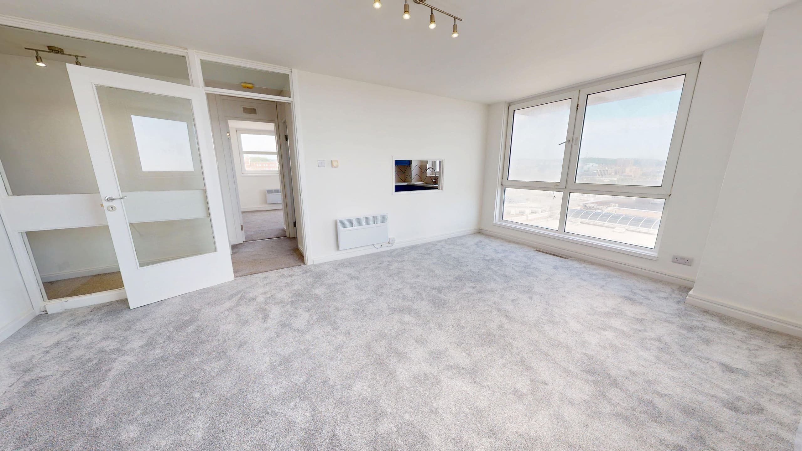 Light-filled renovated living room with sea views and new carpet, Chartwell Place Brighton