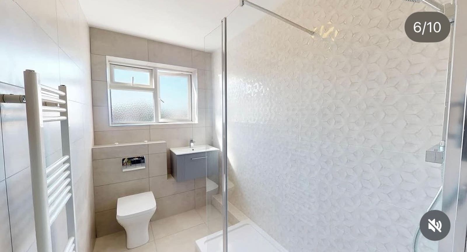 New walk-in shower room with white suite after renovation, Derby Court