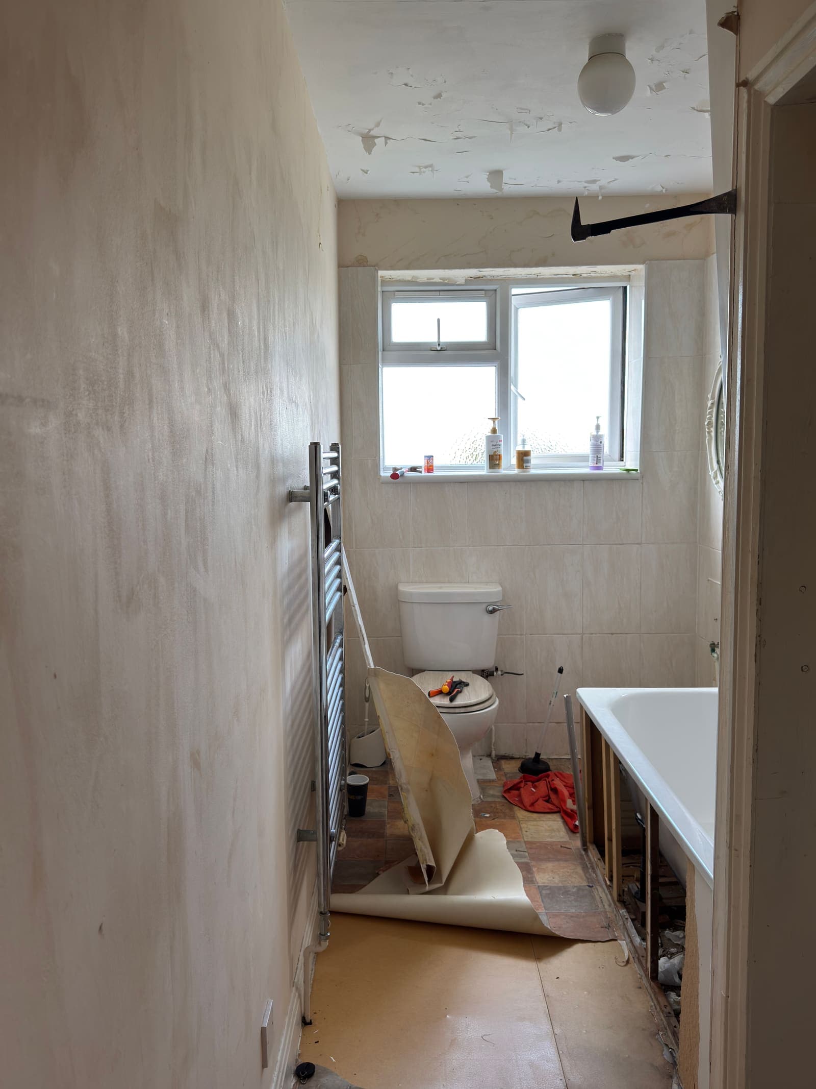 Old bathroom with dated suite and tiling before refurbishment, Derby Court