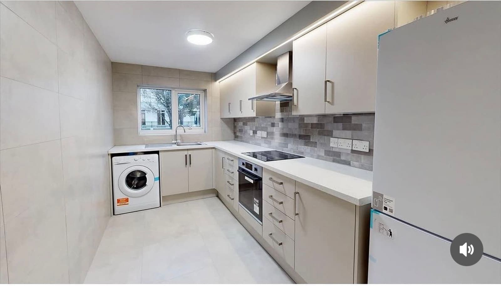 Finished galley kitchen with new units, splashback and appliances after renovation, Heather Court Brighton